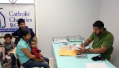 Immigrants at Catholic Charities of the Rio Grande Valley humanitarian respite center in McAllen, Texas.